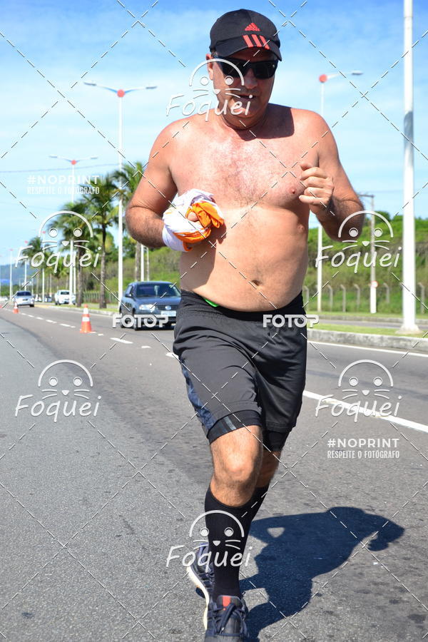 Buy your photos of the event21KES - Meia Maratona do Esprito Santo on Fotop