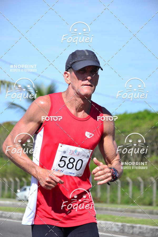 Buy your photos of the event21KES - Meia Maratona do Esprito Santo on Fotop