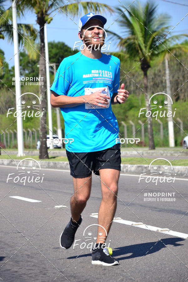Buy your photos of the event21KES - Meia Maratona do Esprito Santo on Fotop