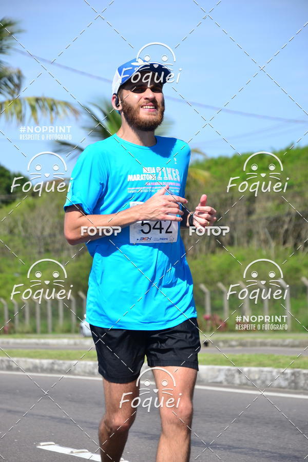 Buy your photos of the event21KES - Meia Maratona do Esprito Santo on Fotop