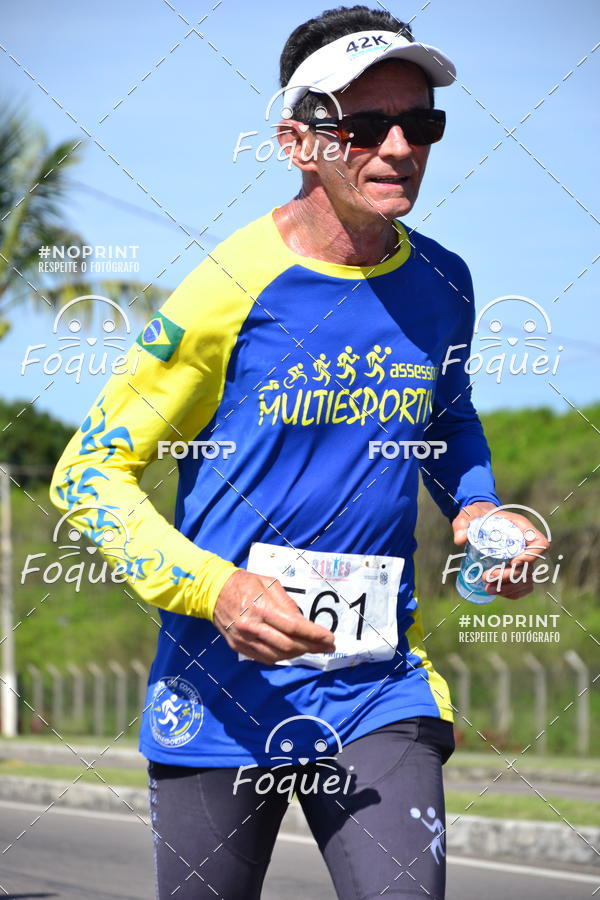 Buy your photos of the event21KES - Meia Maratona do Esprito Santo on Fotop