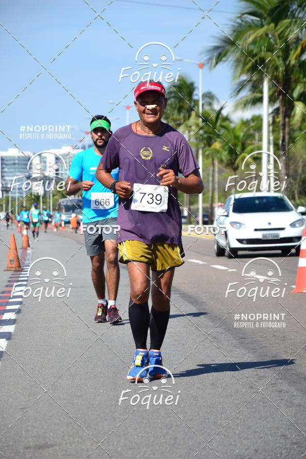 Buy your photos of the event21KES - Meia Maratona do Esprito Santo on Fotop