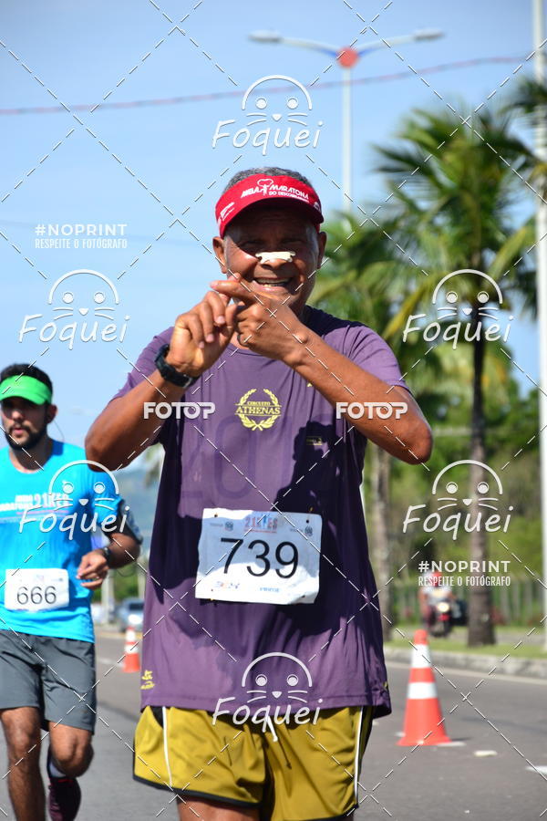 Buy your photos of the event21KES - Meia Maratona do Esprito Santo on Fotop