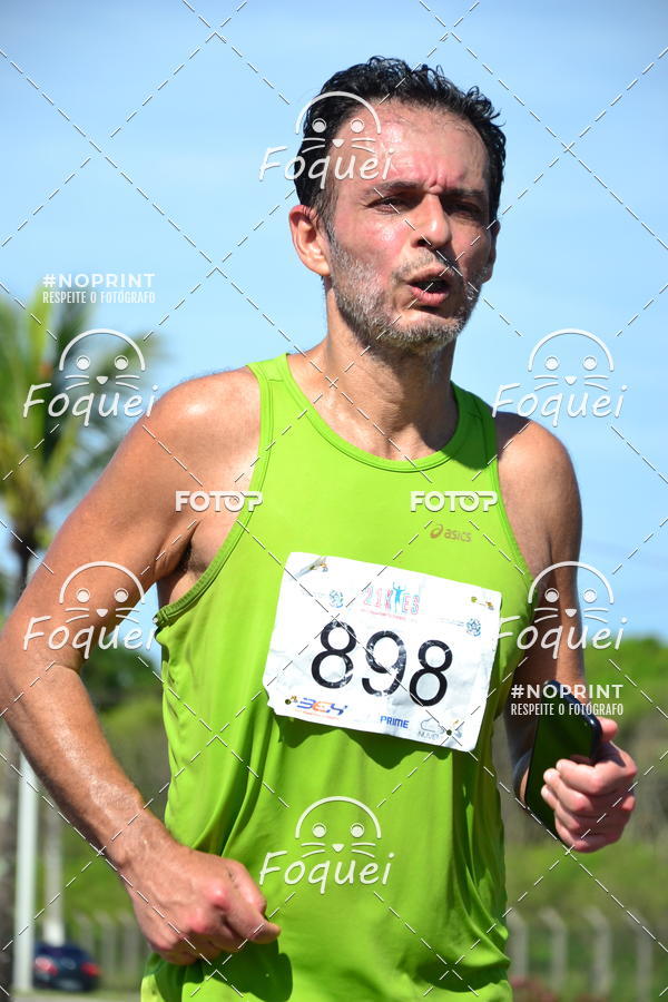 Buy your photos of the event21KES - Meia Maratona do Esprito Santo on Fotop