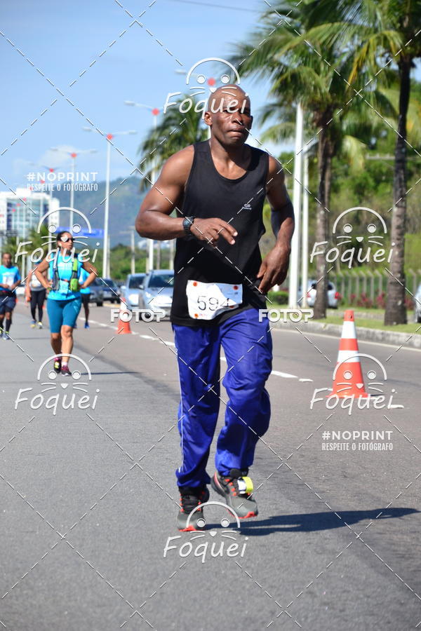 Buy your photos of the event21KES - Meia Maratona do Esprito Santo on Fotop