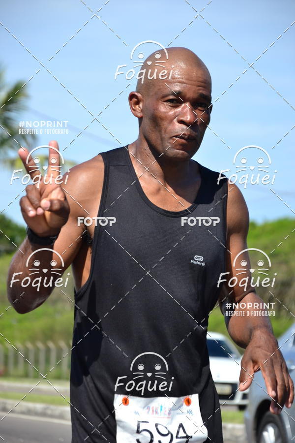 Buy your photos of the event21KES - Meia Maratona do Esprito Santo on Fotop