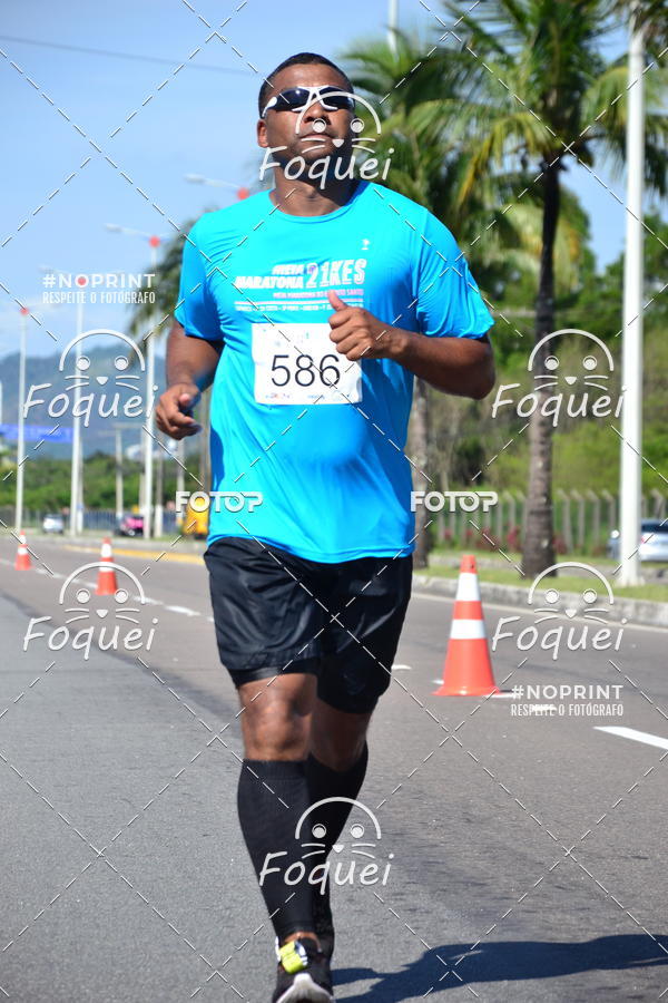 Buy your photos of the event21KES - Meia Maratona do Esprito Santo on Fotop