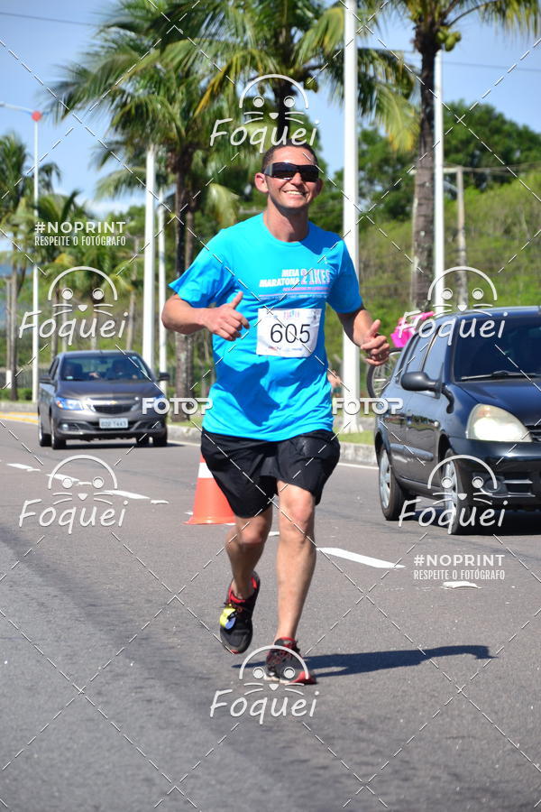 Buy your photos of the event21KES - Meia Maratona do Esprito Santo on Fotop