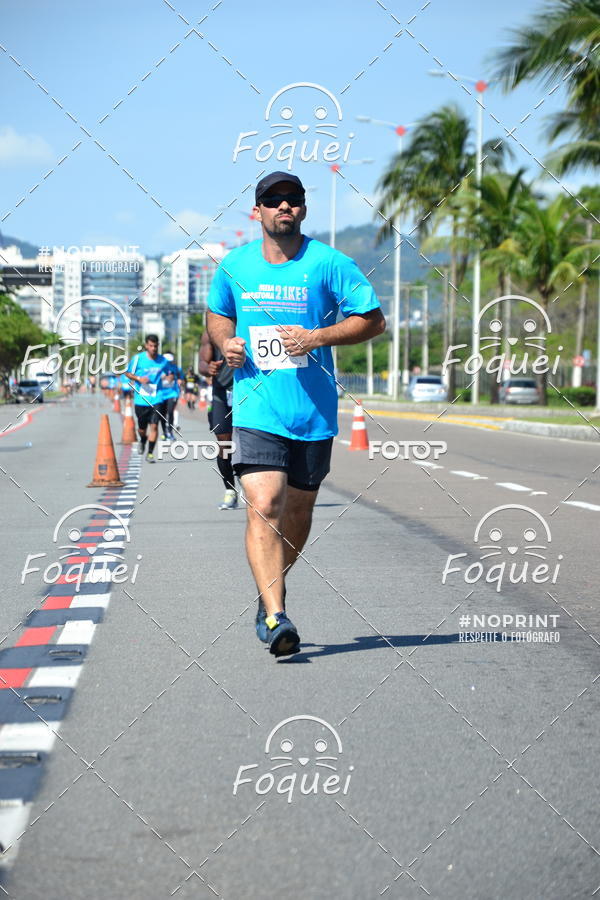 Buy your photos of the event21KES - Meia Maratona do Esprito Santo on Fotop