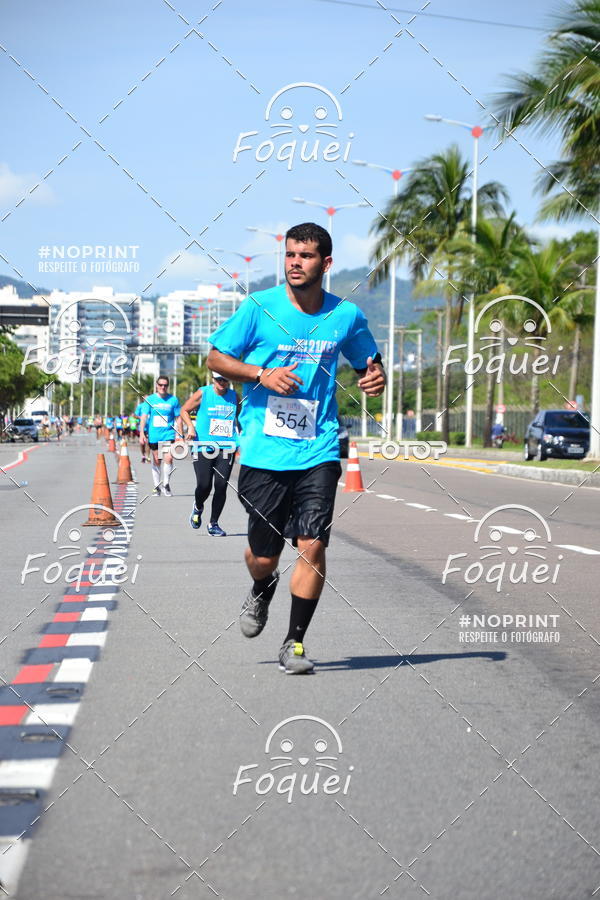 Buy your photos of the event21KES - Meia Maratona do Esprito Santo on Fotop