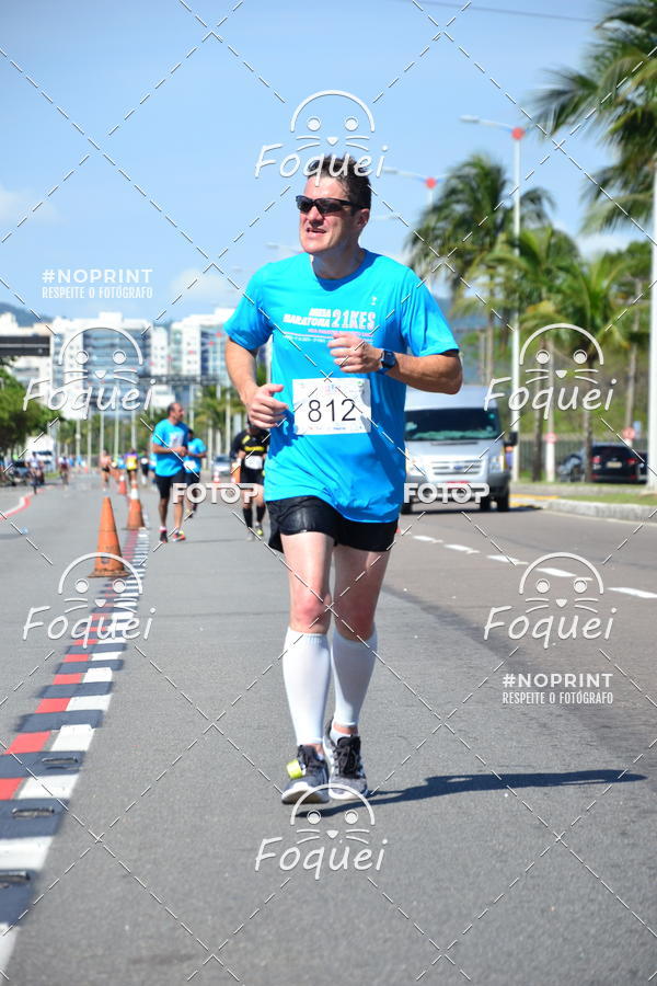 Buy your photos of the event21KES - Meia Maratona do Esprito Santo on Fotop