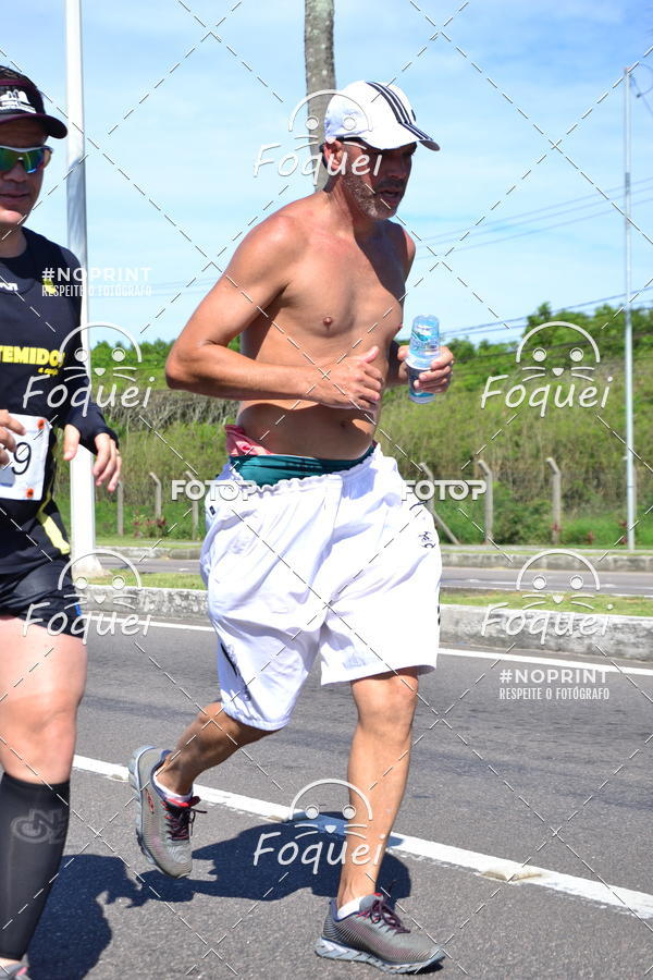 Buy your photos of the event21KES - Meia Maratona do Esprito Santo on Fotop