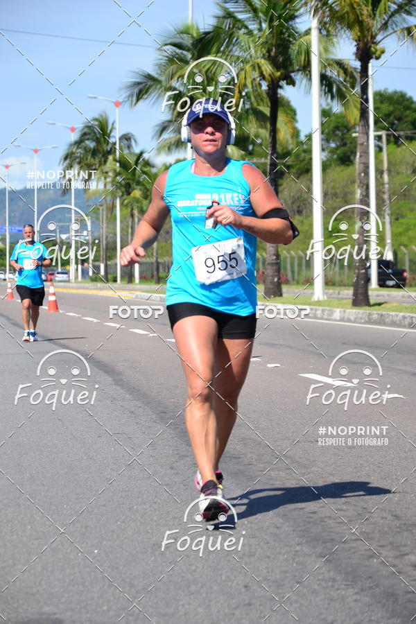 Buy your photos of the event21KES - Meia Maratona do Esprito Santo on Fotop