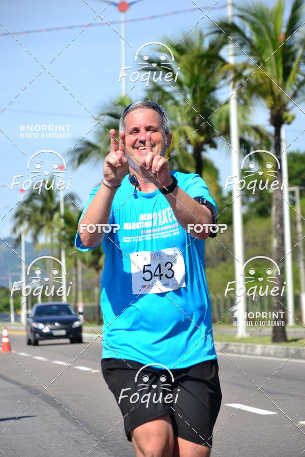 Buy your photos of the event21KES - Meia Maratona do Esprito Santo on Fotop