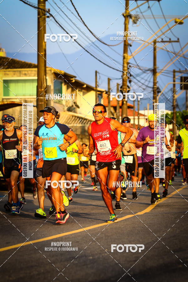 Buy your photos of the eventguia 13K Praia Grande on Fotop