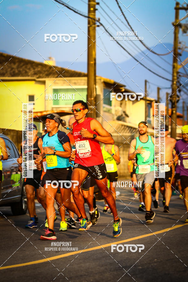 Buy your photos of the eventguia 13K Praia Grande on Fotop
