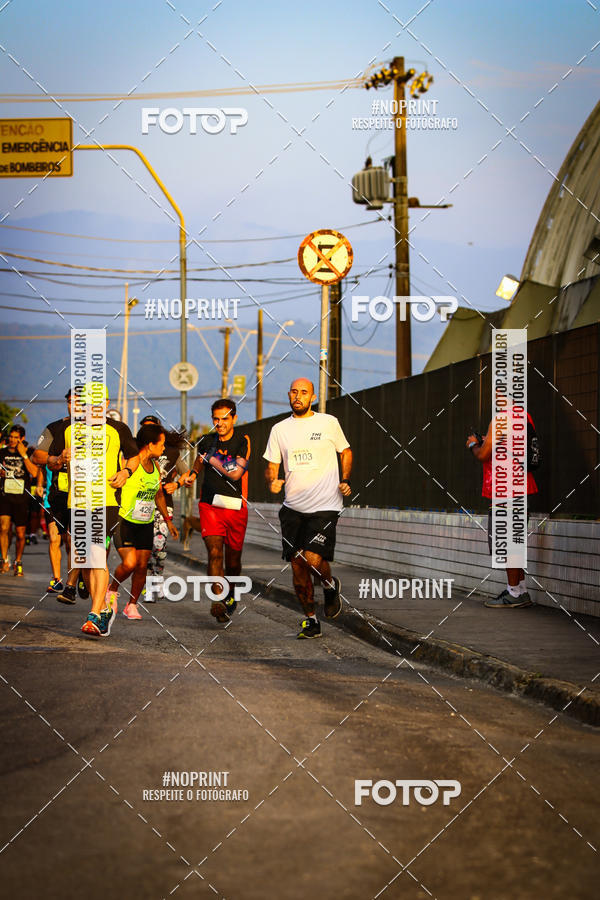 Buy your photos of the eventguia 13K Praia Grande on Fotop