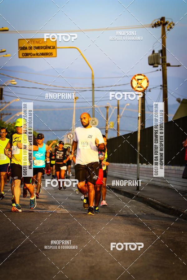 Buy your photos of the eventguia 13K Praia Grande on Fotop