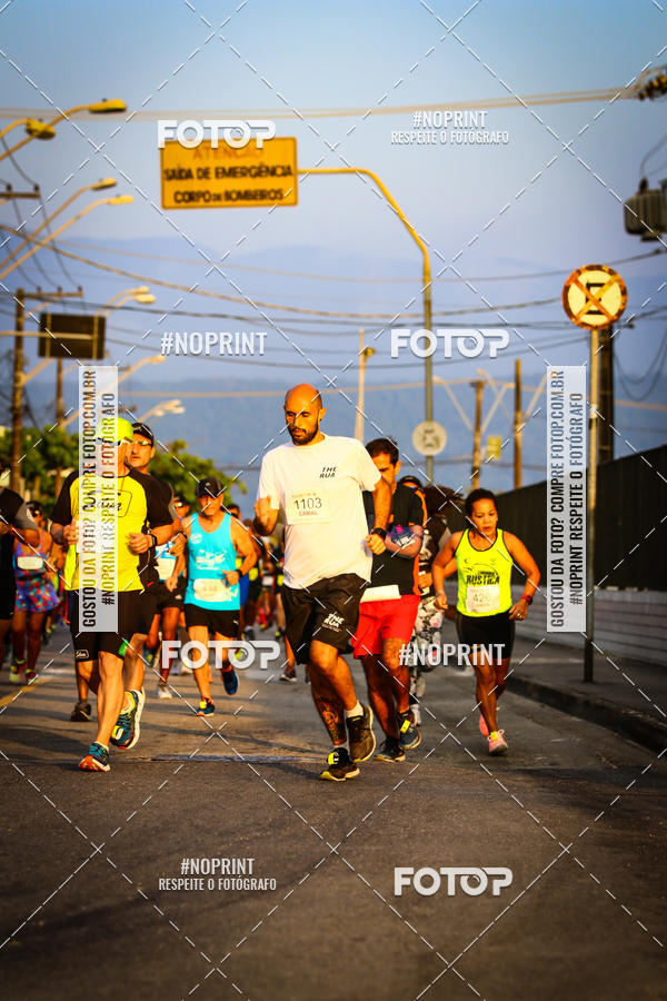 Buy your photos of the eventguia 13K Praia Grande on Fotop