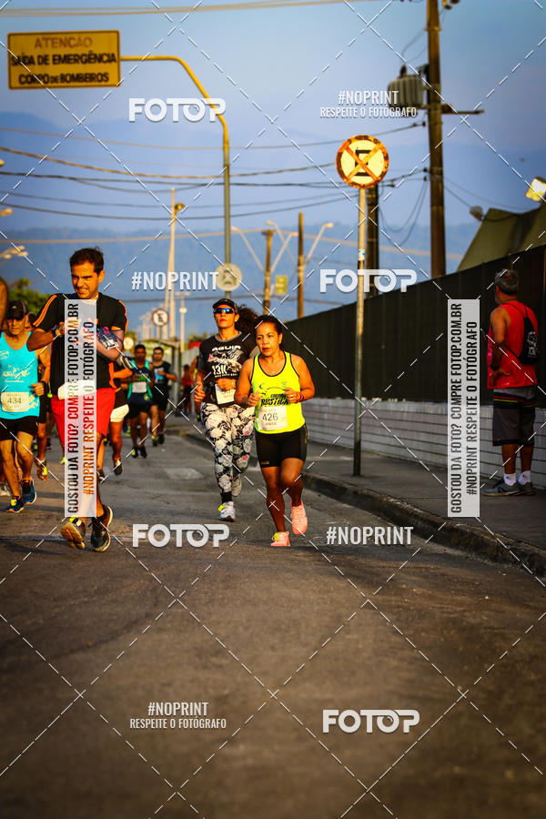 Buy your photos of the eventguia 13K Praia Grande on Fotop