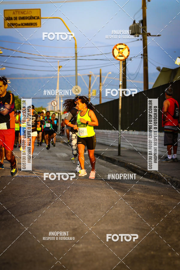 Buy your photos of the eventguia 13K Praia Grande on Fotop
