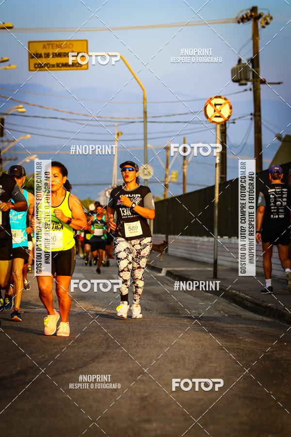 Buy your photos of the eventguia 13K Praia Grande on Fotop
