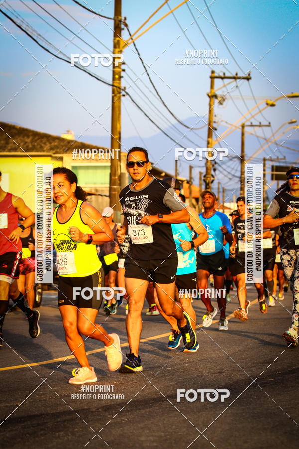 Buy your photos of the eventguia 13K Praia Grande on Fotop