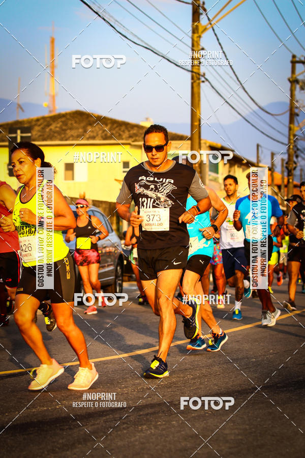 Buy your photos of the eventguia 13K Praia Grande on Fotop
