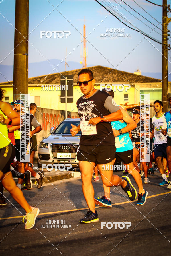 Buy your photos of the eventguia 13K Praia Grande on Fotop