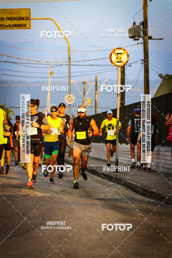 Buy your photos of the eventguia 13K Praia Grande on Fotop