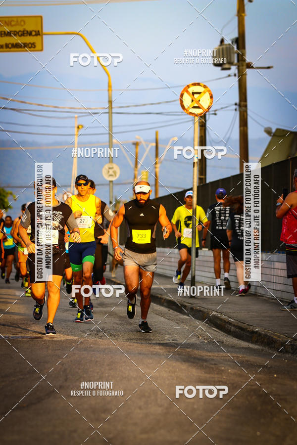 Buy your photos of the eventguia 13K Praia Grande on Fotop