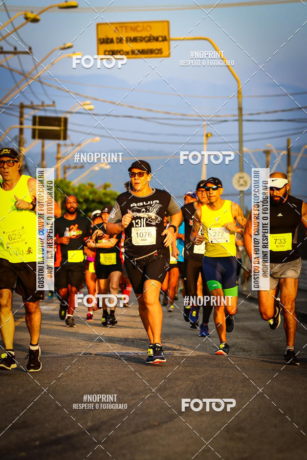 Buy your photos of the eventguia 13K Praia Grande on Fotop