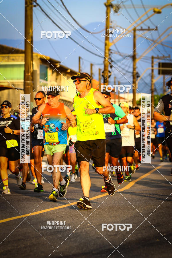 Buy your photos of the eventguia 13K Praia Grande on Fotop