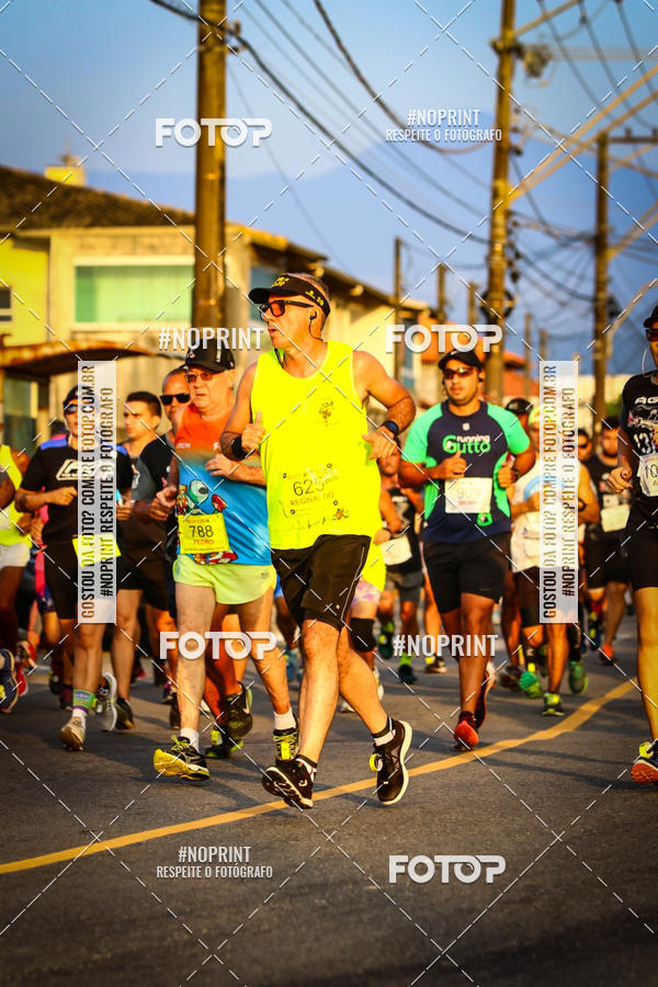 Buy your photos of the eventguia 13K Praia Grande on Fotop