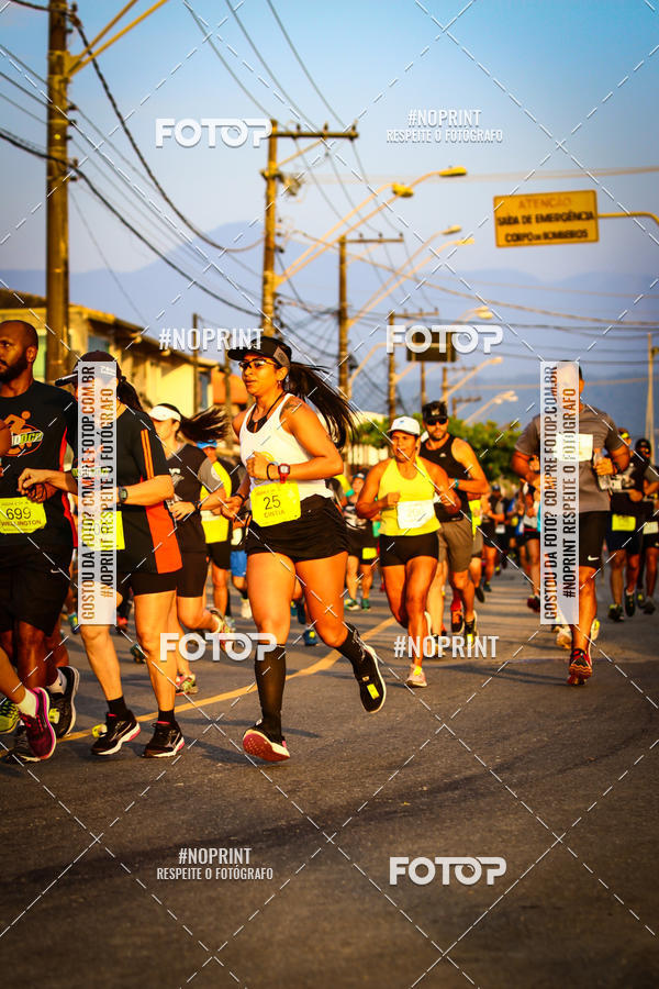 Buy your photos of the eventguia 13K Praia Grande on Fotop