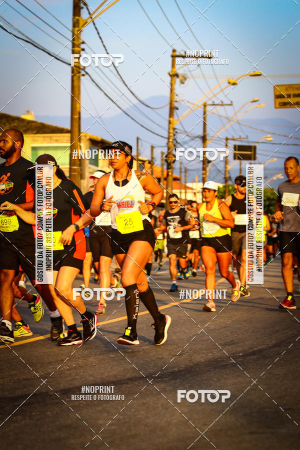 Buy your photos of the eventguia 13K Praia Grande on Fotop