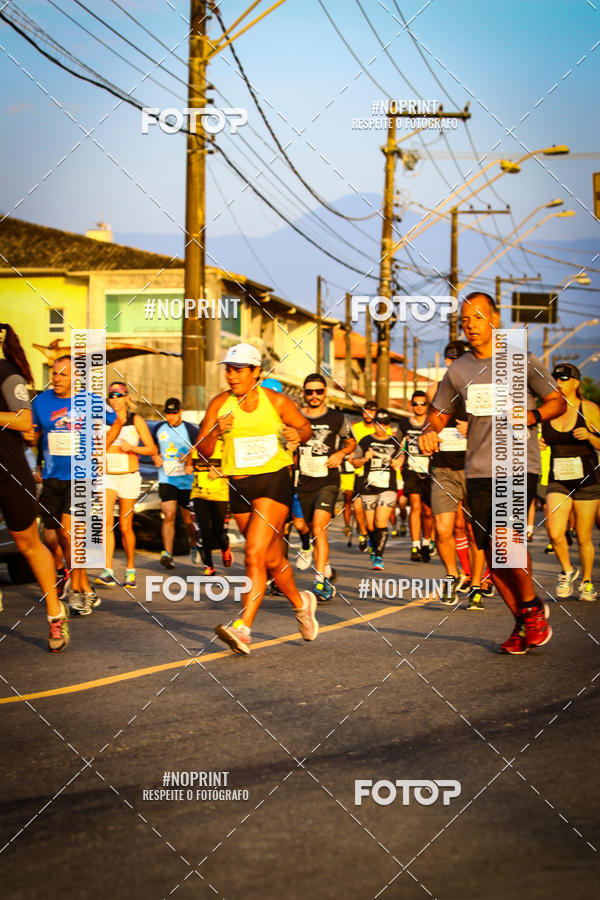 Buy your photos of the eventguia 13K Praia Grande on Fotop