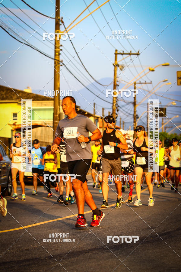 Buy your photos of the eventguia 13K Praia Grande on Fotop