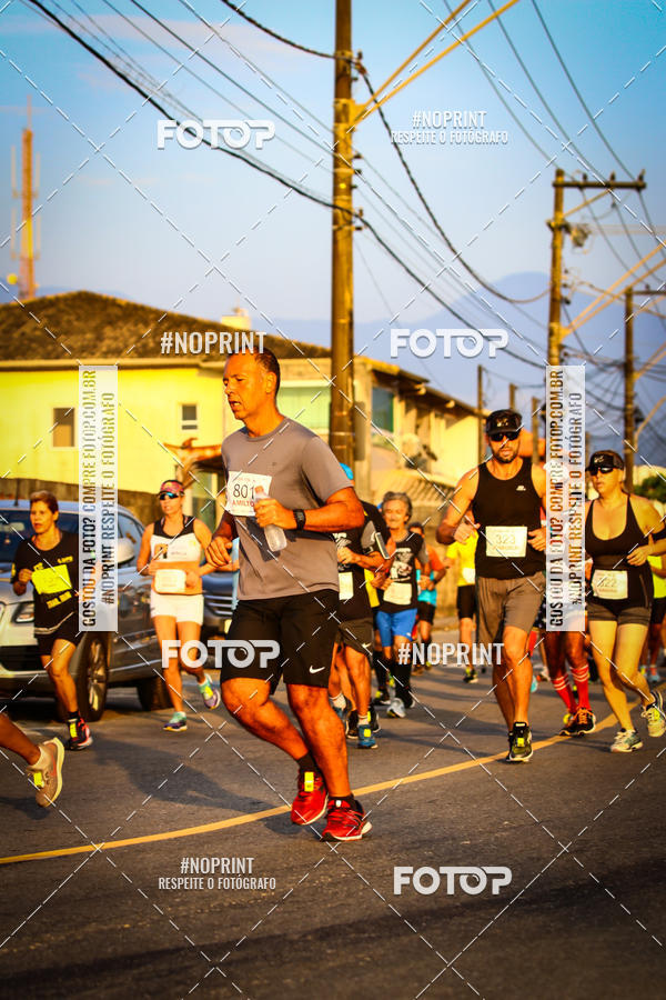 Buy your photos of the eventguia 13K Praia Grande on Fotop