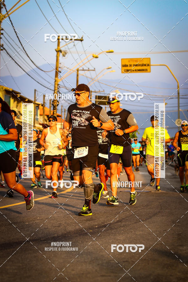 Buy your photos of the eventguia 13K Praia Grande on Fotop