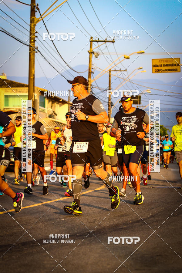 Buy your photos of the eventguia 13K Praia Grande on Fotop