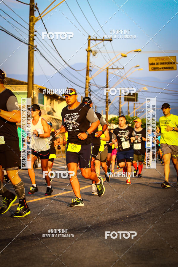 Buy your photos of the eventguia 13K Praia Grande on Fotop