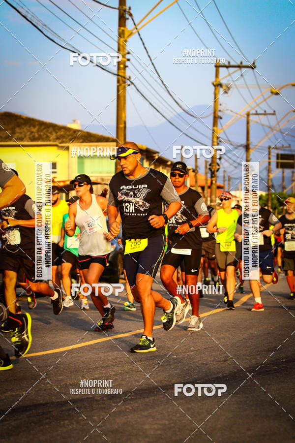 Buy your photos of the eventguia 13K Praia Grande on Fotop