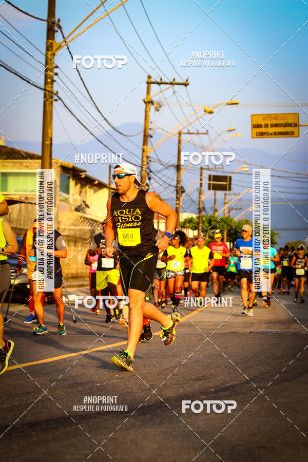 Buy your photos of the eventguia 13K Praia Grande on Fotop