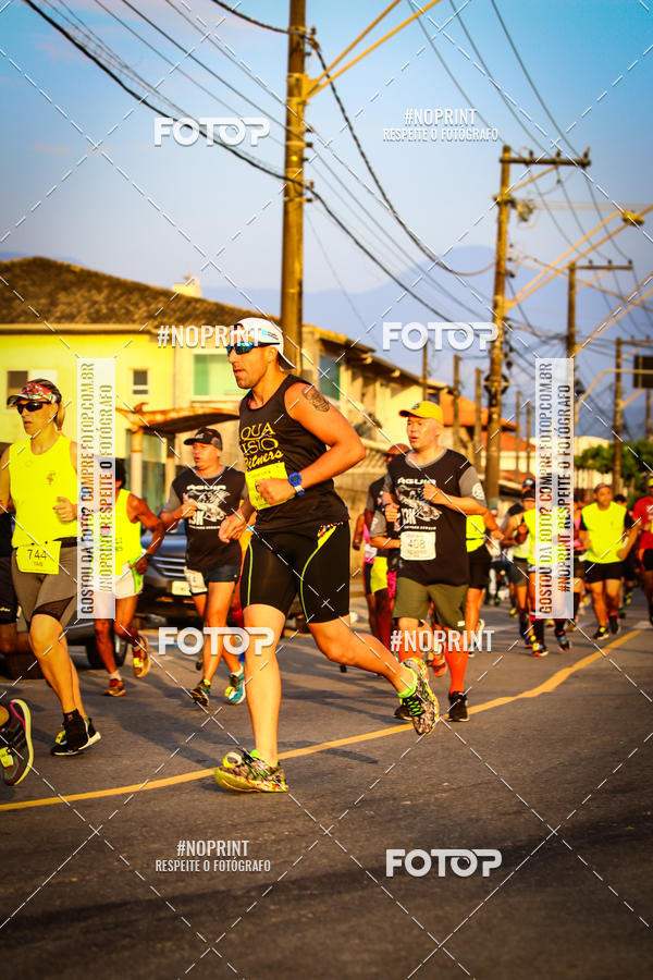 Buy your photos of the eventguia 13K Praia Grande on Fotop