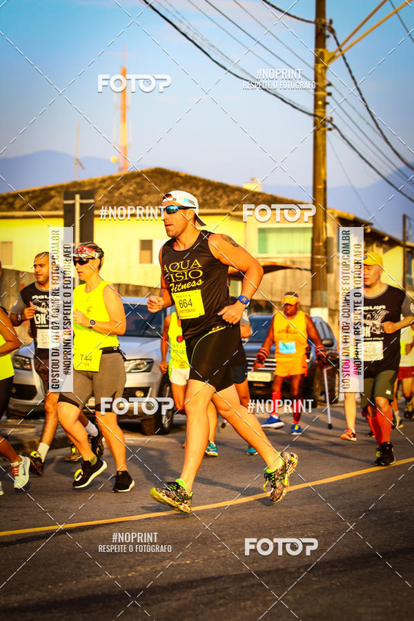 Buy your photos of the eventguia 13K Praia Grande on Fotop