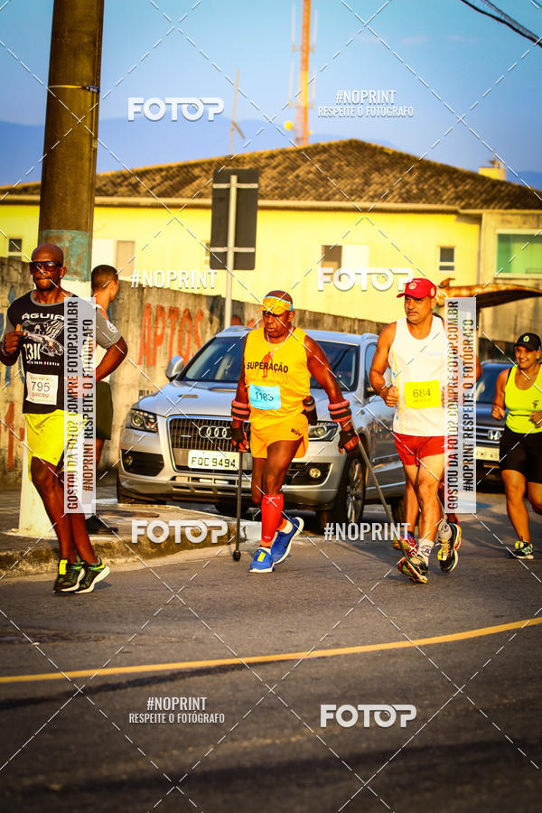 Buy your photos of the eventguia 13K Praia Grande on Fotop