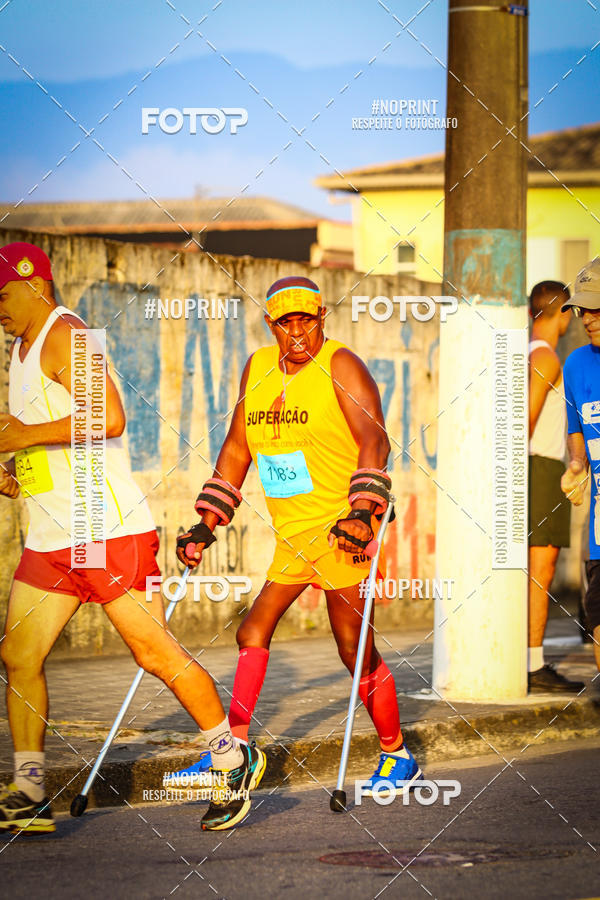 Buy your photos of the eventguia 13K Praia Grande on Fotop