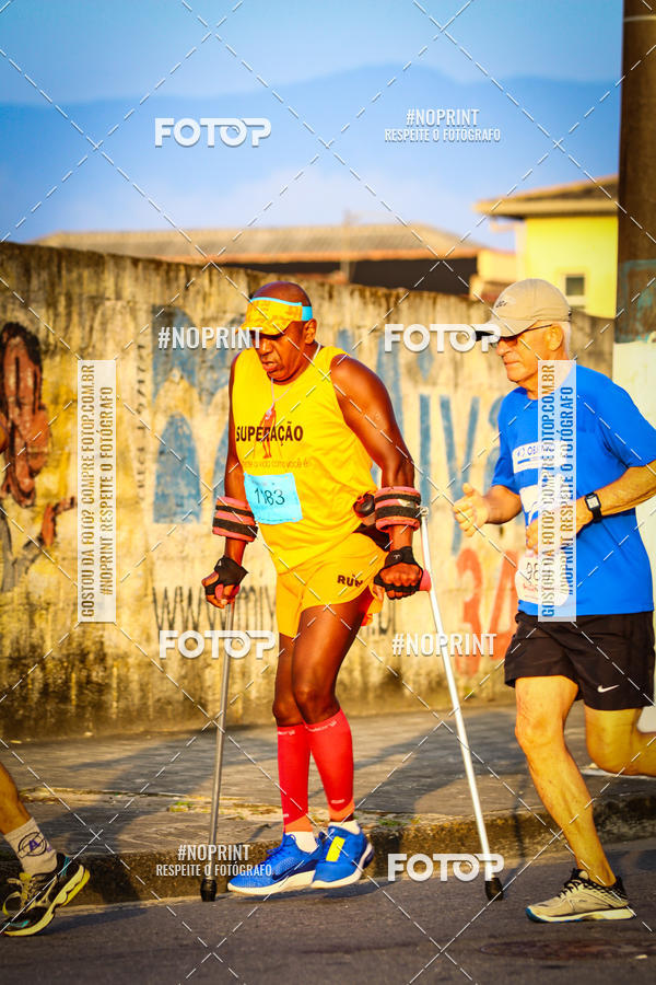 Buy your photos of the eventguia 13K Praia Grande on Fotop