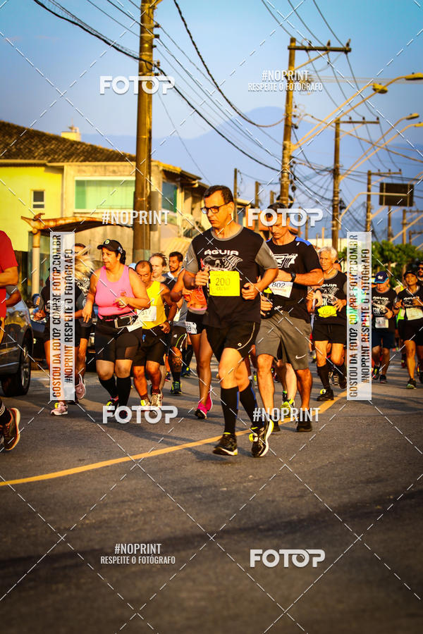Buy your photos of the eventguia 13K Praia Grande on Fotop